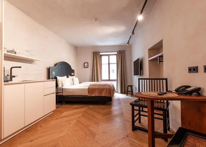 Aparthotel H5 Grauer Baer & 4*